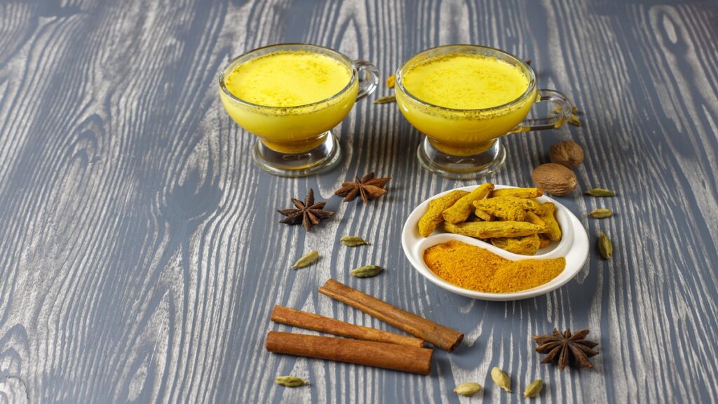 Traditional indian drink turmeric golden milk .